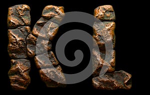 Set of rocky letters K, L. Font of stone on black background. 3d