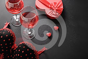 Set for romantic dating and Valentine's day, love gift, bustier underwear, wine and chocolate sweets photo