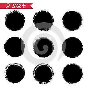 Set of round black stickers ink blots isolates on white background