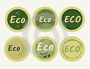 Set of round eco stickers, badges, icons, buttons with leaves in green
