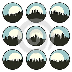 Set of round emblems of silhouettes a big city with skyscrapers with moon behind.