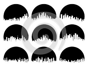 Set of round emblems of silhouettes sun behind the city high-rise buildings.