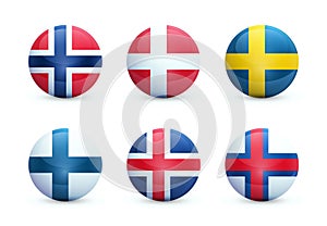 Set of round shiny spheres with national flags of scandinavian countries