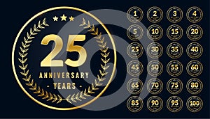 Set of rounded anniversary golden labels or emblems