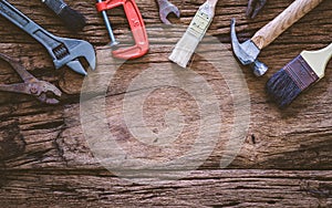 Set of rusty hand tools renovation on grunge wood. copyspace image. construction instrument background with blank space concept