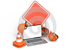 Set of safety helmet or hard hat, road traffic cones and sign near laptop