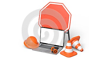 Set of safety helmet or hard hat, road traffic cones and sign near laptop