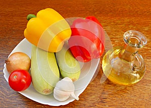 Set of salad and bottle of vegetable oil