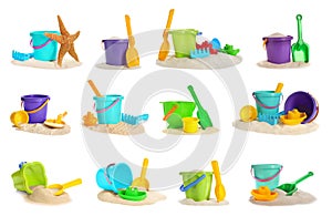 Set of sand piles with different plastic toys on white background.