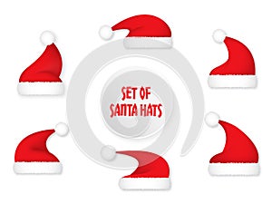Set of Santa hats. More versions of Christmas symbols in red color combinations.