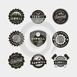 Set of sawmill logos. retro styled woodwork emblems. vector illustration