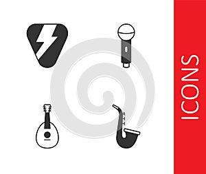 Set Saxophone, Guitar pick, Mandolin and Microphone icon. Vector