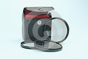 Set of screw-on photographic glass filters and a case for safe storage and carrying