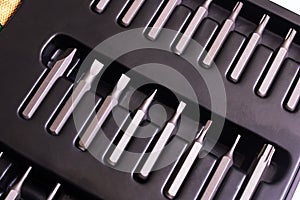 Set with screwdriver and bits, background or texture