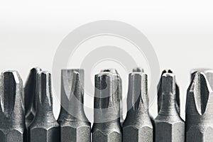 Set screwdriver bits white background. Home and industrial tools.