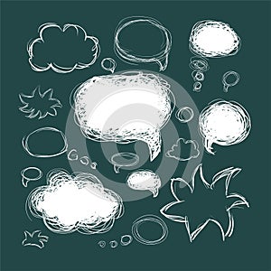 Set of scribble speech bubbles on a green background.