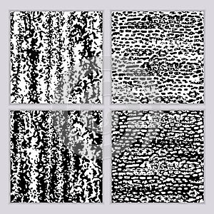 A set of seamless abstract monochrome patterns. Black and white print with wavy lines, dots and spots. Brush strokes are hand-