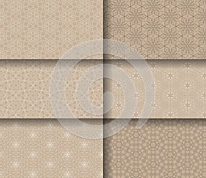 Set of seamless patterns tile with mandalas.