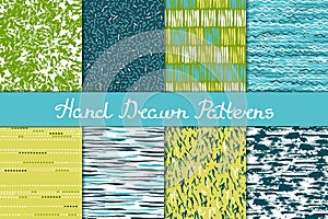 Set of seamless patterns in white, green, blue and yellow. Ink and brush. Hand drawn.