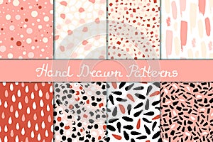 Set of seamless patterns in white, pink, red and black. Ink and brush. Hand drawn.