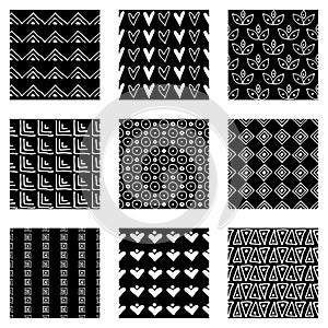 Set of seamless vector patterns. Black and white geometrical endless backgrounds with hand drawn geometric shapes, triangles, circ