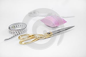 Set of sewing scissors, measuring tape