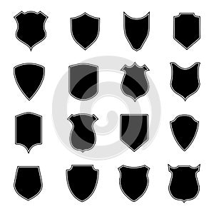 Set shield shapes. Badge, crest and icon of security. Blank black banner and emblem for coat of safety service or police. Heraldic