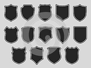 Set of shields over grey background photo