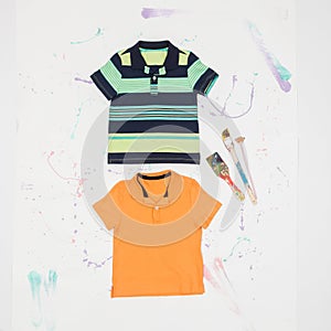 Set of shirts in different colors and colorful prints for children