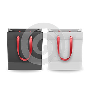 Set of shopping bags from plastic or paper with handles on white background, shopping bags of black and white colors, vector