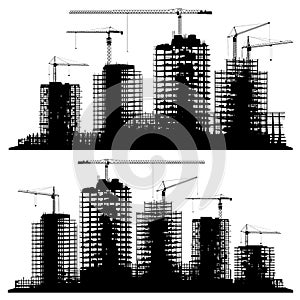 Set of silhouettes of a construction site with cranes and buildings.