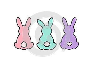 A set of silhouettes of Easter bunnies sitting with their backs.