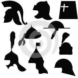 A set of silhouettes of medieval military helmets