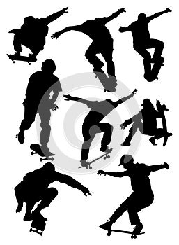 Set of silhouettes of skateboarders vector