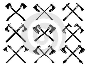 Set of simple monochrome images of crossed medieval axes and hatchets