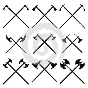 Set of simple monochrome images of crossed medieval axes and poleaxes