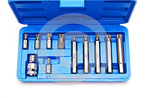 A set of single-sided chrome steel bits in a blue plastic box