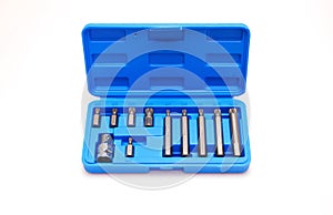 A set of single-sided chrome steel bits in a blue plastic box