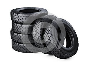 Set of six big vehicle truck tires stacked.