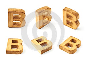 Set of six block wooden letters isolated