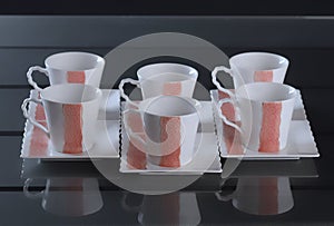 Set of six porcelain cups of coffee