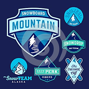 Set of Ski Snowboard Snow Mountains Sport Logos or Vintage Labels, Colorful on Blue Background