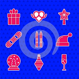 Set Ski and sticks, Christmas ball, Glass of champagne, Santa Claus hat, snow globe, Snowboard, star and Gift box icon