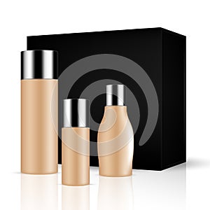 SET of skin toned beauty products/cosmetics bottles and containers with silver lid and black box photo