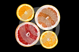 Set of sliced citrus fruits orange, grapefruit