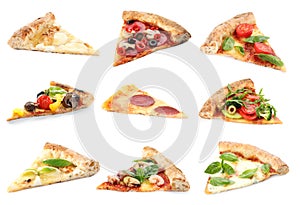 Set with slices of different pizzas on background