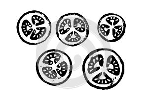 A set of slices of tomatoes cut into rings. In black color. Isolated on white background. Printmaking style.