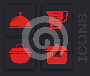 Set Slow cooker, Covered with tray of food, Measuring cup and Cooking pot icon. Vector