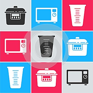 Set Slow cooker, Microwave oven and Measuring cup icon. Vector