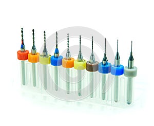 Set of small drills for small jobs in a plastic box isolated on a white background